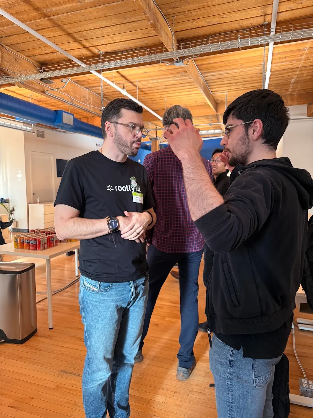 Attendees chatting and connecting at CNCF Toronto Meetup (photo 2)