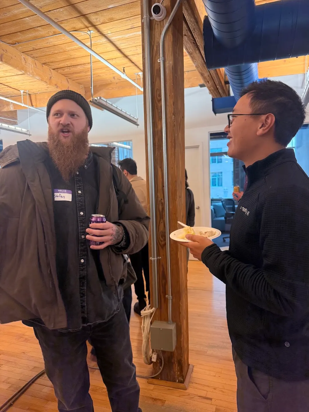 Attendees chatting and connecting at CNCF Toronto Meetup (photo 8)