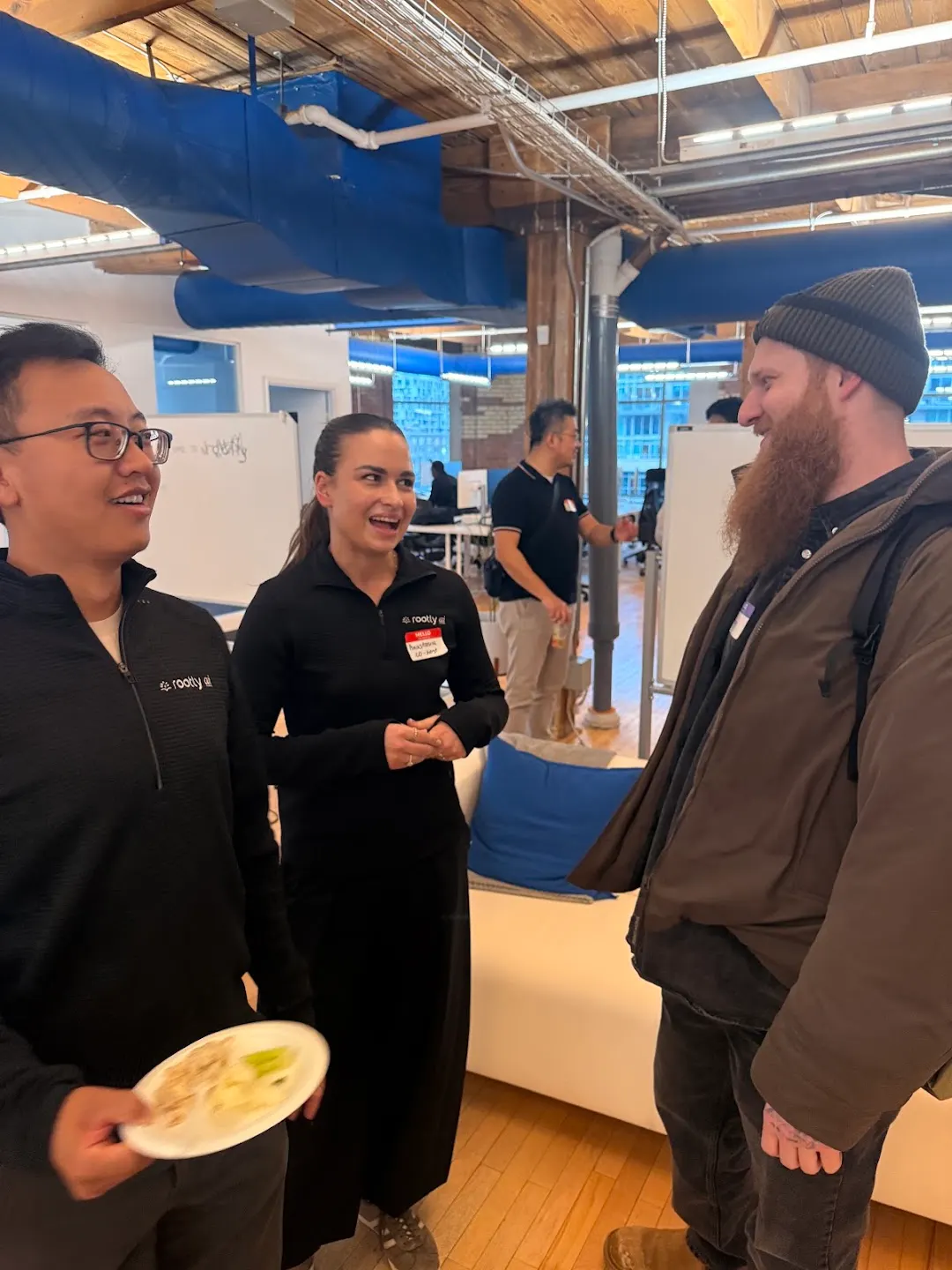 Attendees chatting and connecting at CNCF Toronto Meetup (photo 9)