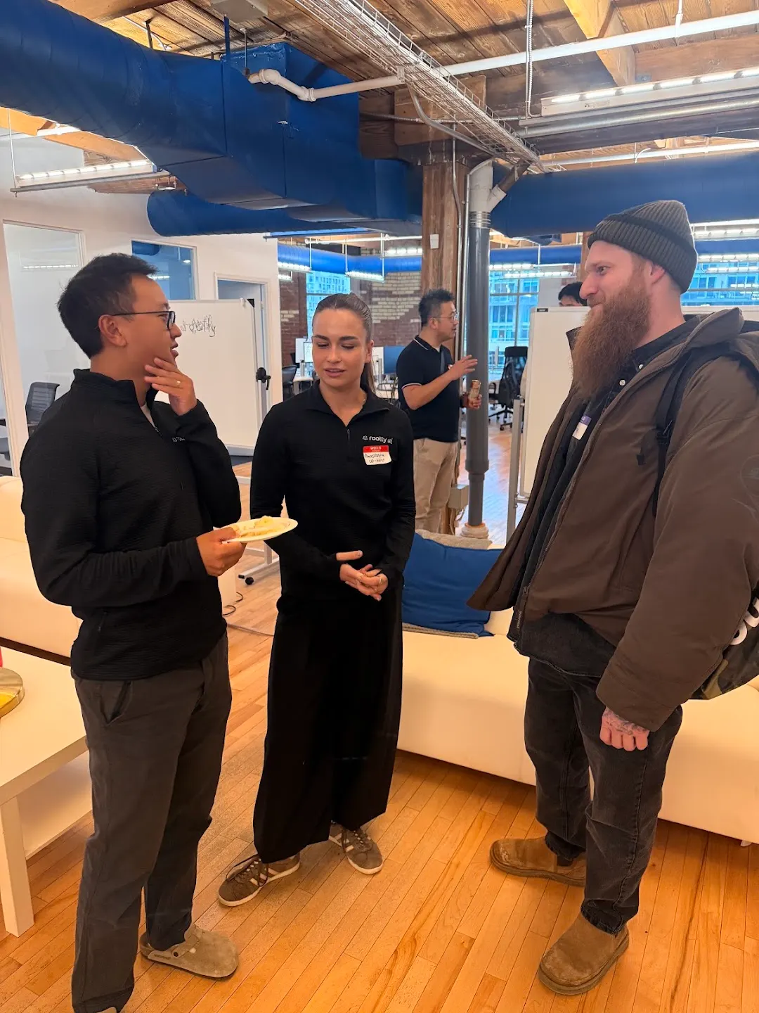 Attendees chatting and connecting at CNCF Toronto Meetup (photo 10)
