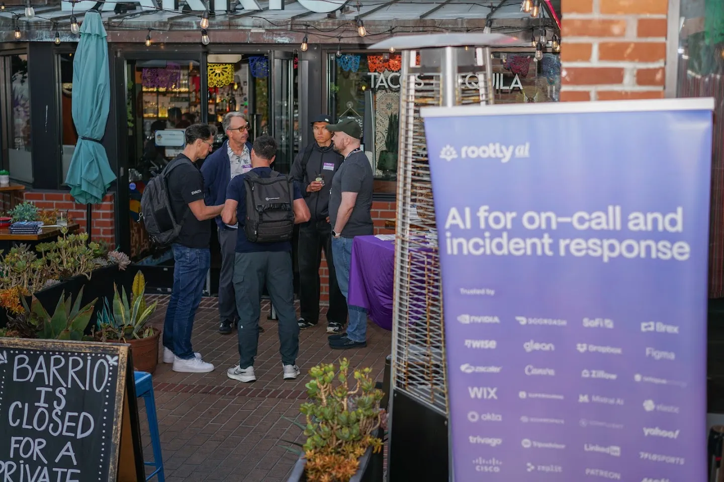 Rootly event sign at the entrance to Barrio