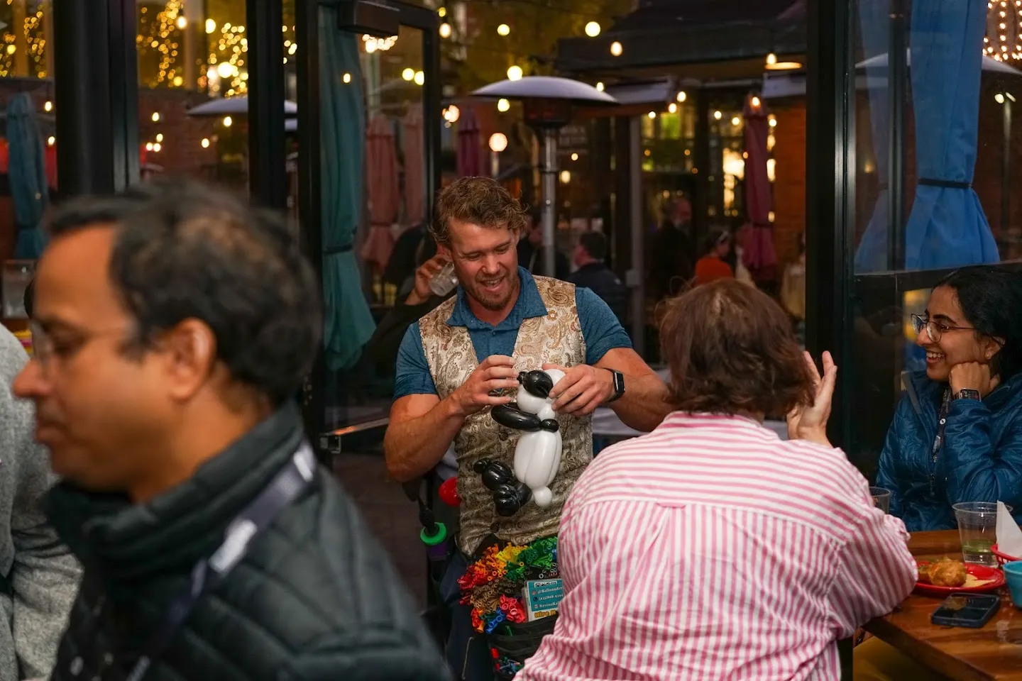 Conversations around the terrace tables after dark