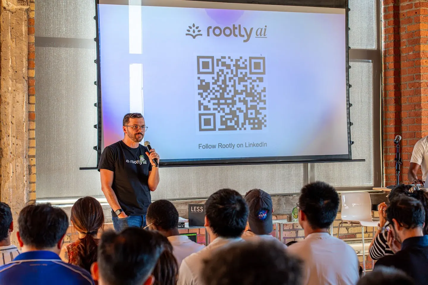 A speaker presenting to the community at Lovable (Toronto Meetup) (photo 2)
