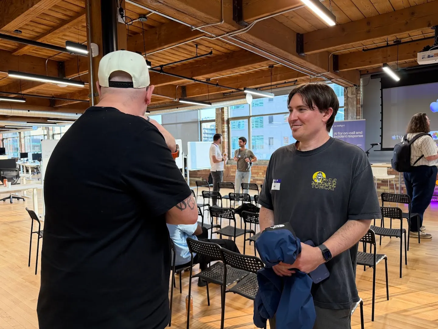 Attendees chatting and connecting at Ruby Toronto x Rootly ( June 25th, 2026) (photo 7)
