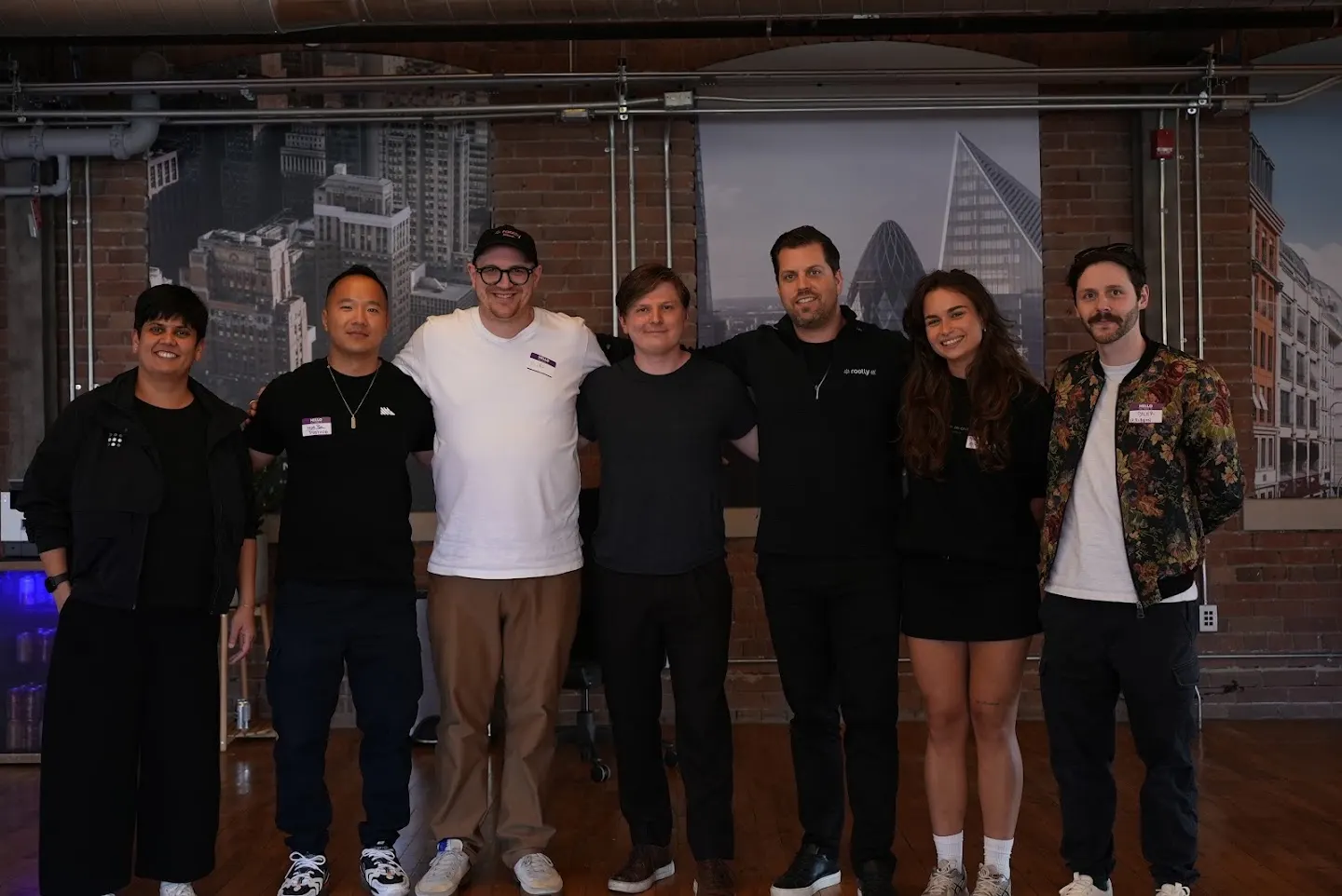 Community members posing together at Toronto Tech Week Kickoff w/ PostHog, Tailscale, & Ribbon AI (photo 1)