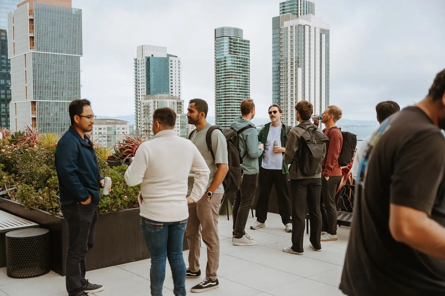 Attendees chatting and connecting at SF Rooftop Tech Mixer & Demo Night at SVB (photo 6)