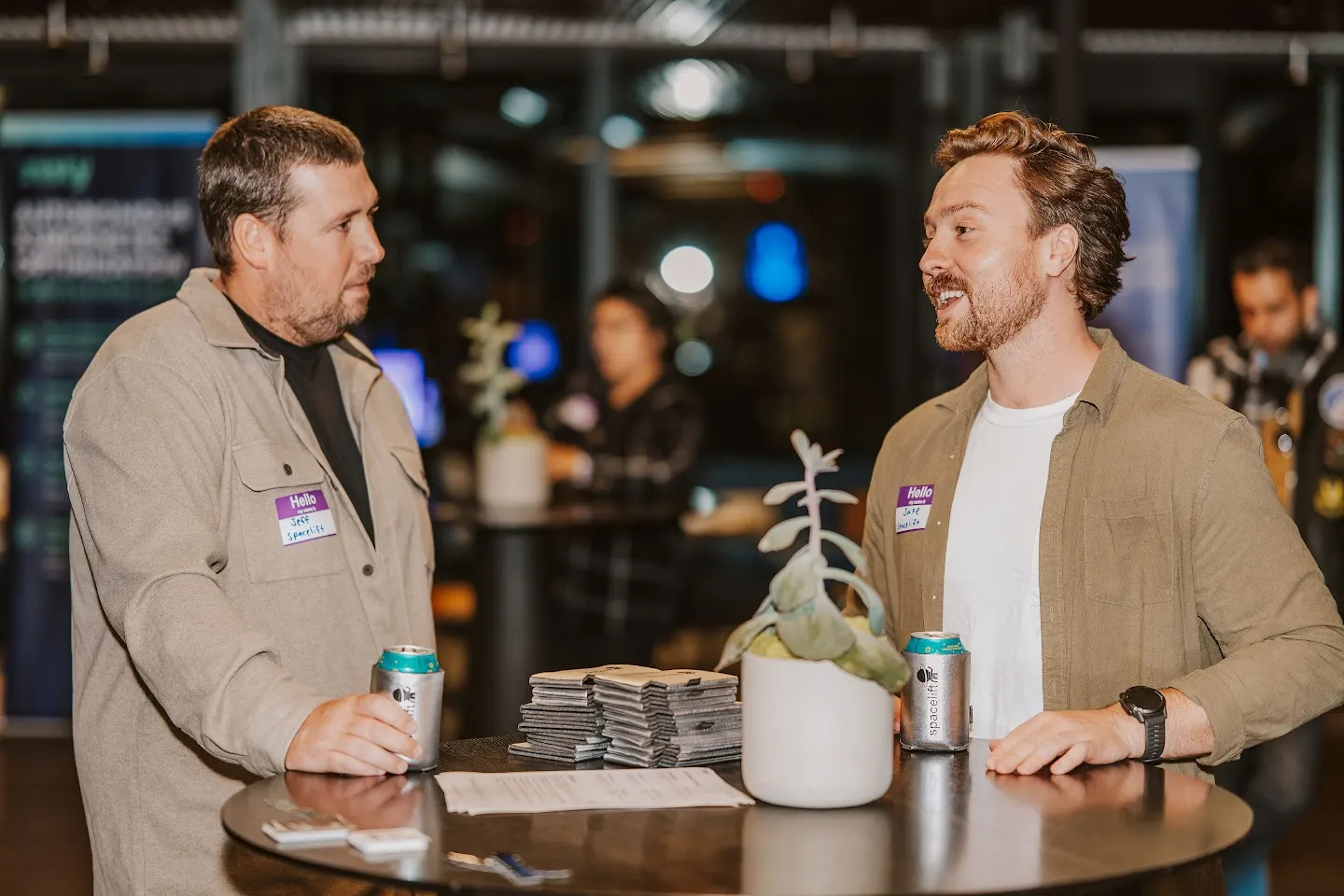 Attendees chatting and connecting at SF Rooftop Tech Mixer & Demo Night at SVB (photo 9)