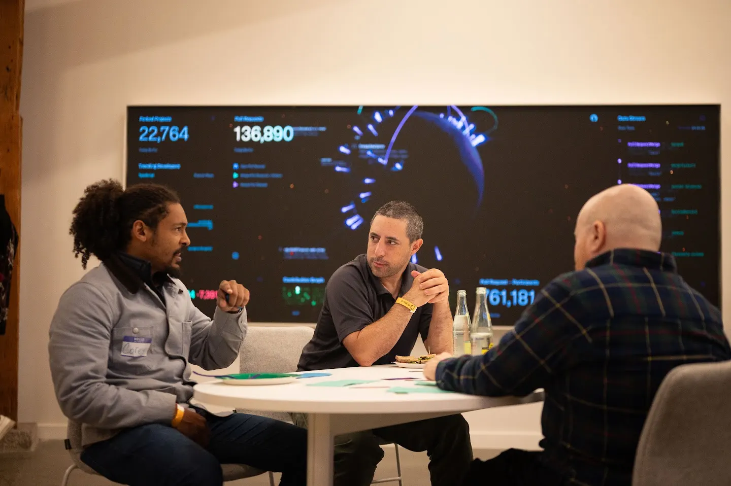 Attendees chatting and connecting at Rootly AI Labs @ GitHub SF (photo 4)