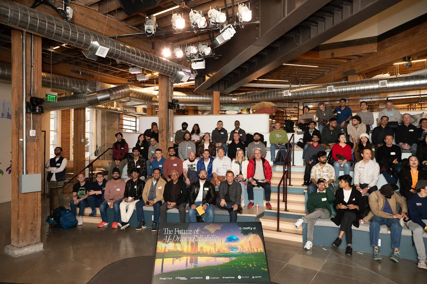 Community members posing together at Rootly AI Labs @ GitHub SF (photo 5)