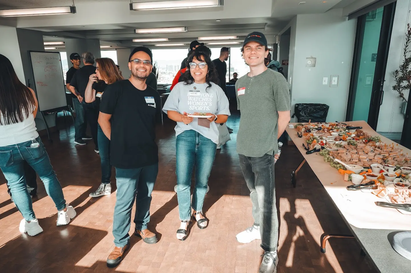 Community members posing together at Rootly AI Meetup DevTools Demo Night (photo 2)