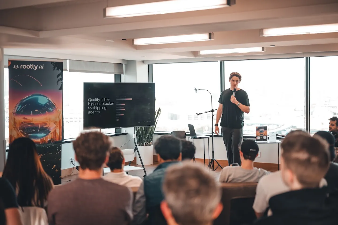 A speaker presenting to the community at Rootly AI Meetup DevTools Demo Night (photo 7)