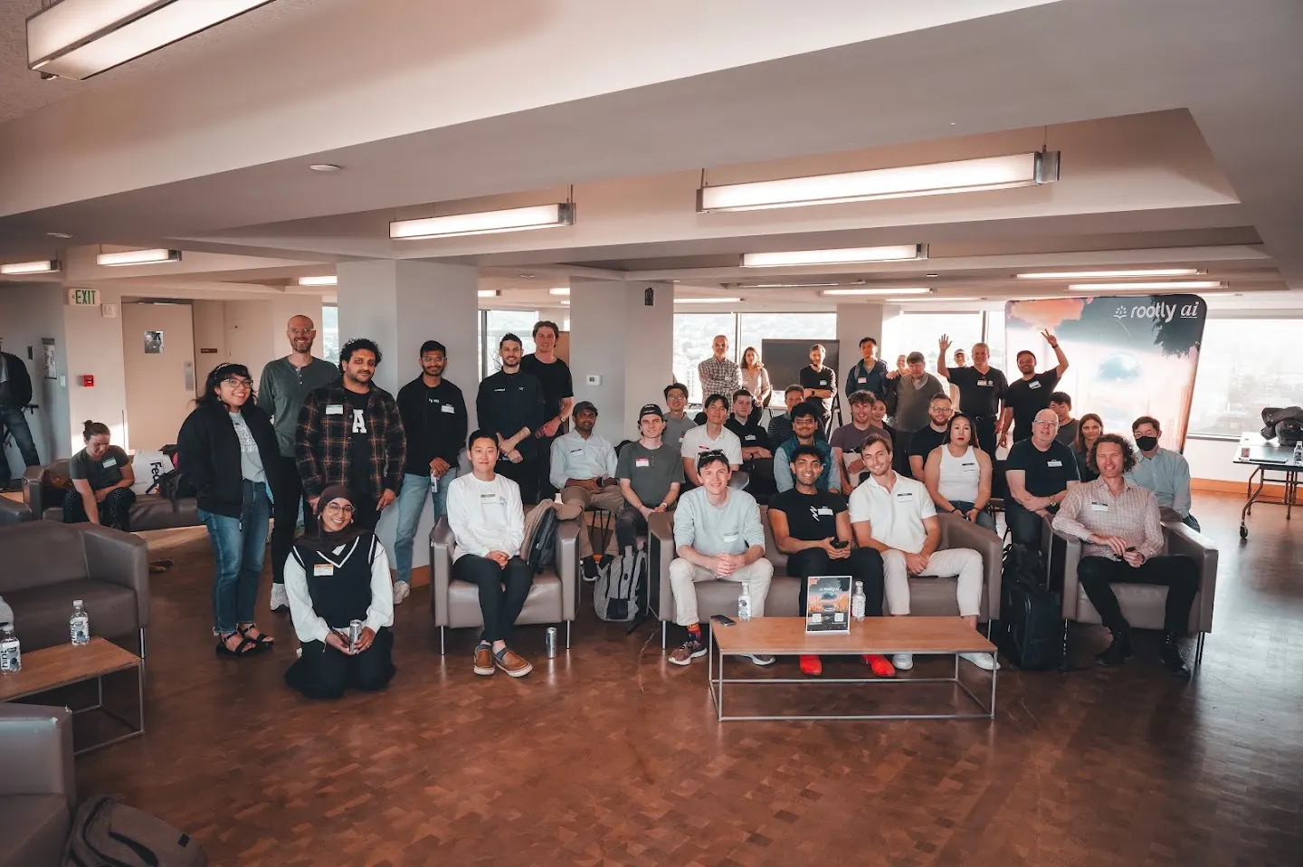 Community members posing together at Rootly AI Meetup DevTools Demo Night (photo 8)