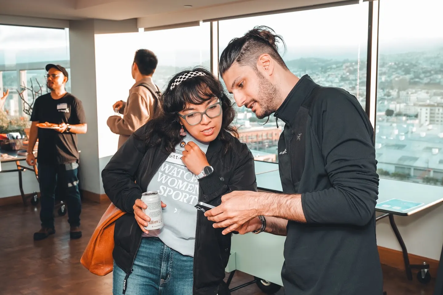 Attendees chatting and connecting at Rootly AI Meetup DevTools Demo Night (photo 9)