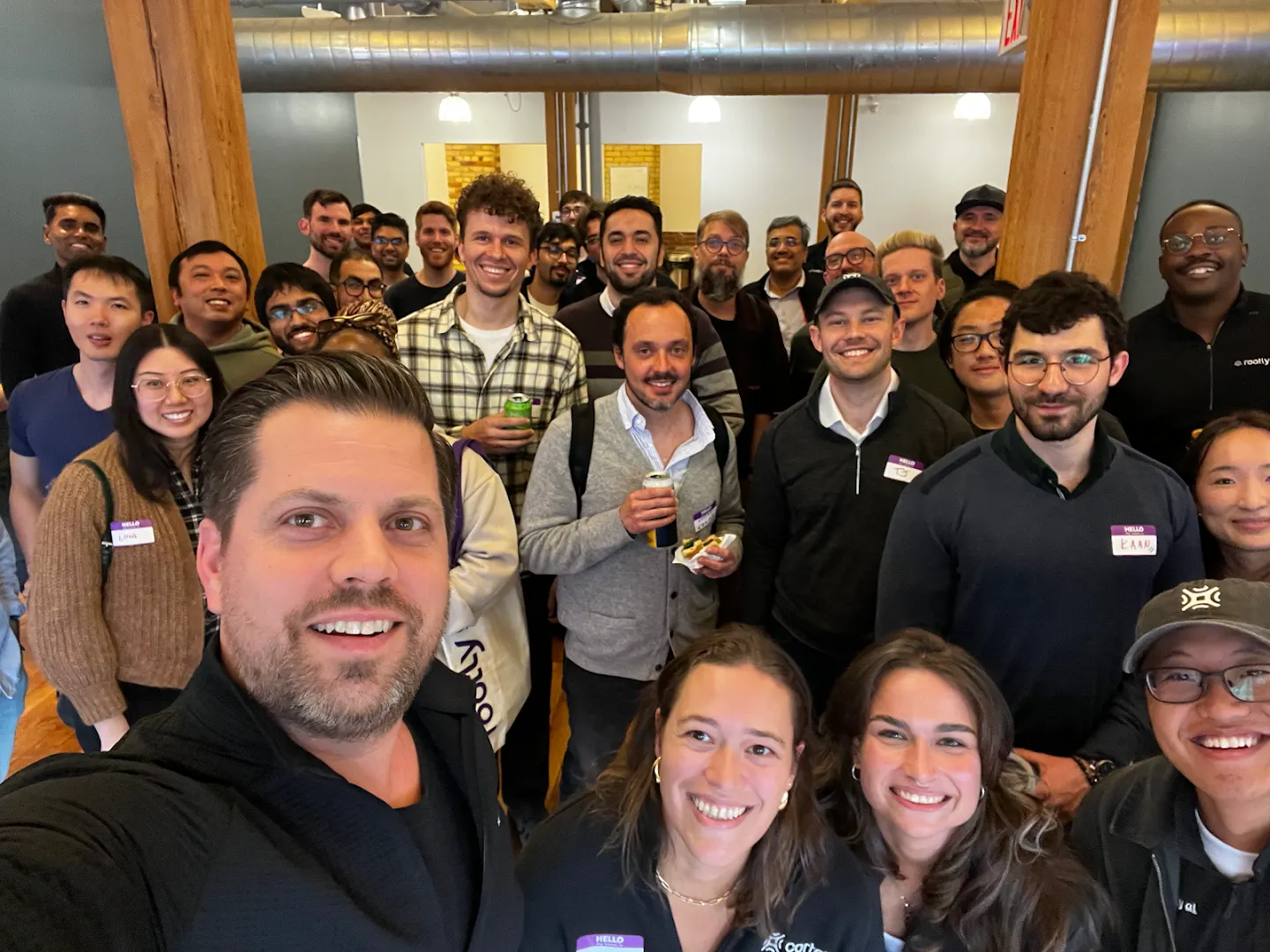 Community members posing together at Rootly AI x Cortex Engineering Mixer (Toronto) (photo 1)