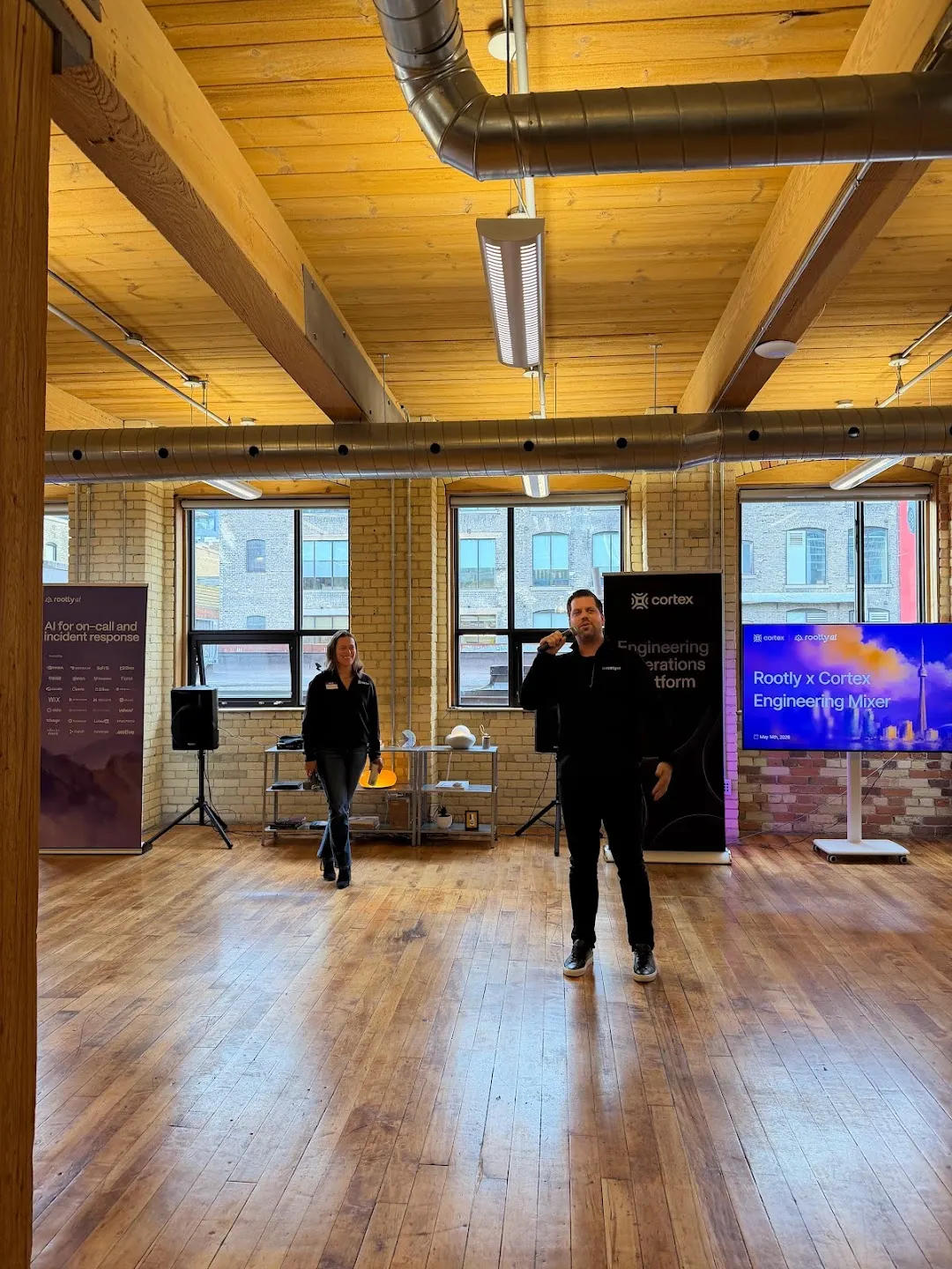 A speaker presenting to the community at Rootly AI x Cortex Engineering Mixer (Toronto) (photo 6)