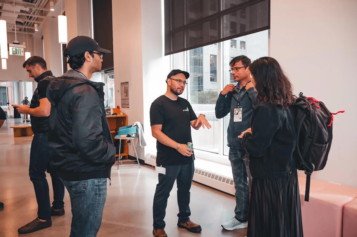 Attendees chatting and connecting at Rootly AI Meetup @ AWS Builder Loft (photo 4)
