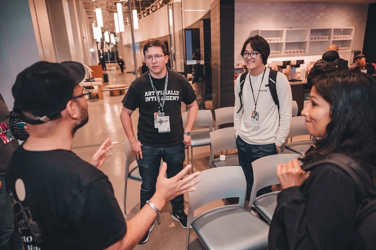 Attendees chatting and connecting at Rootly AI Meetup @ AWS Builder Loft (photo 9)