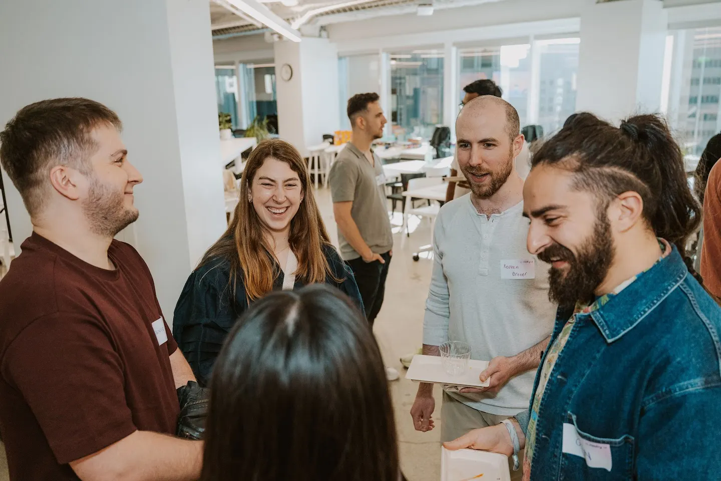 Attendees chatting and connecting at Rootly Meet Up (SF) - Running AI at Enterprise Scale (photo 5)