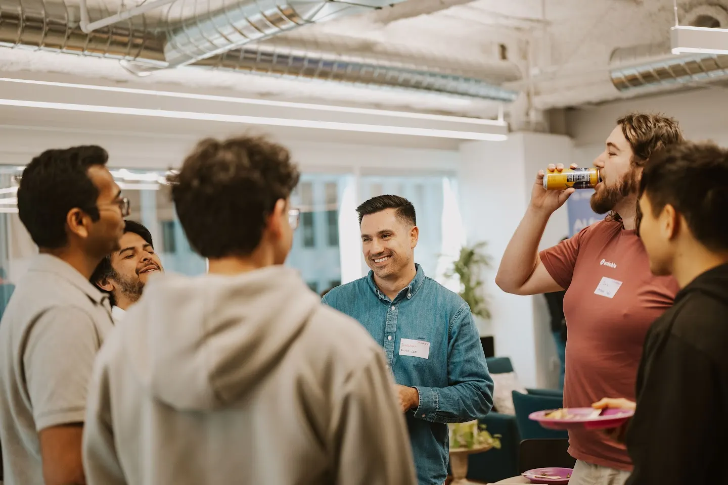Attendees chatting and connecting at Rootly Meet Up (SF) - Running AI at Enterprise Scale (photo 9)