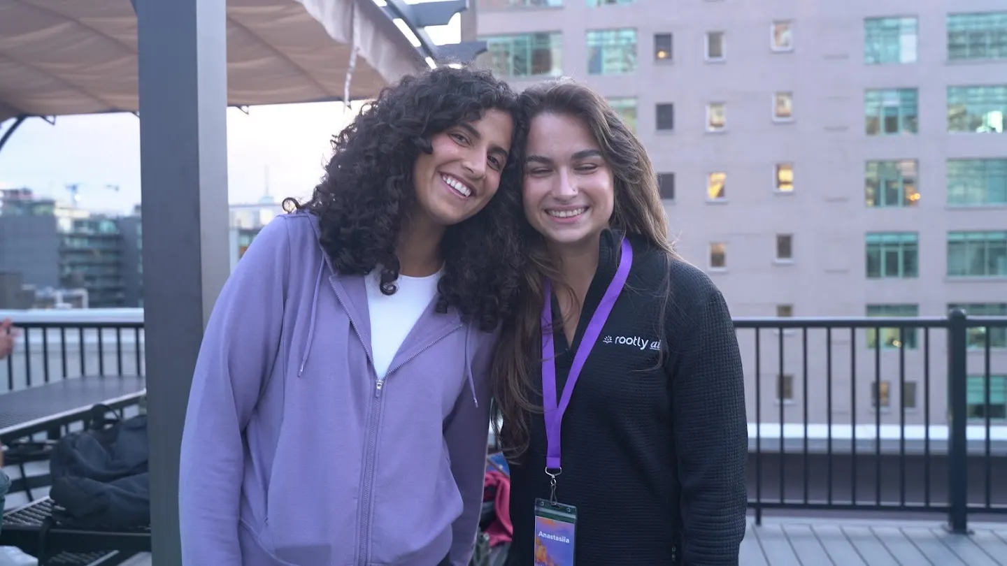 Community members posing together at Rooftop yoga w Rootly x Chatbase (photo 8)