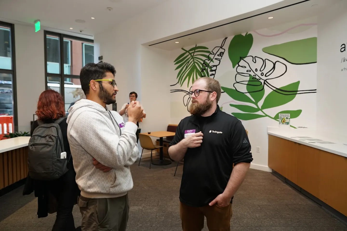 Attendees chatting and connecting at BYOC Meetup w/ Twingate (photo 2)
