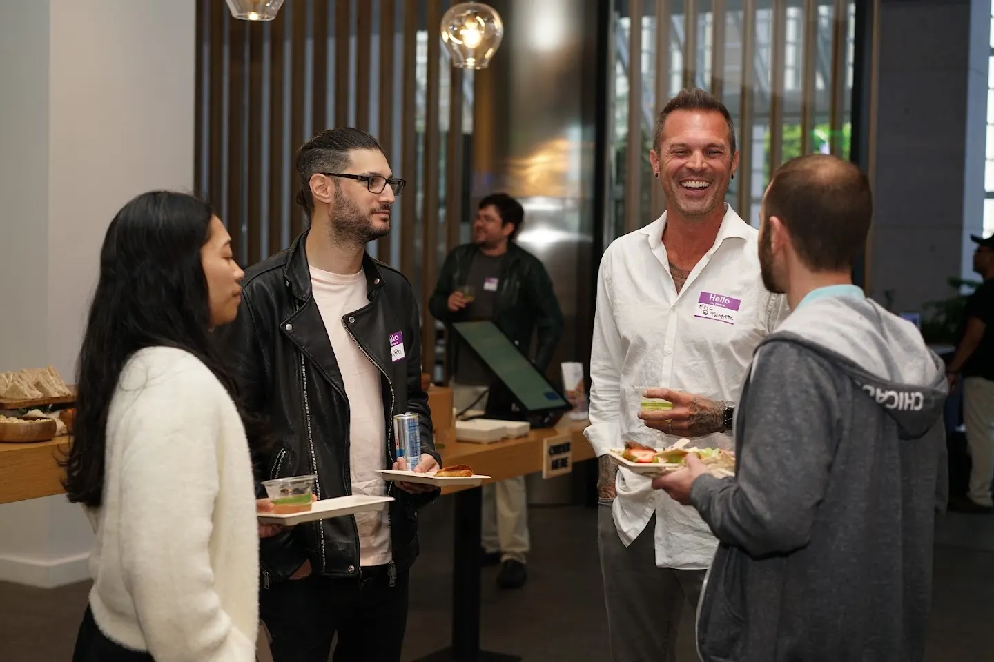 Attendees chatting and connecting at BYOC Meetup w/ Twingate (photo 8)