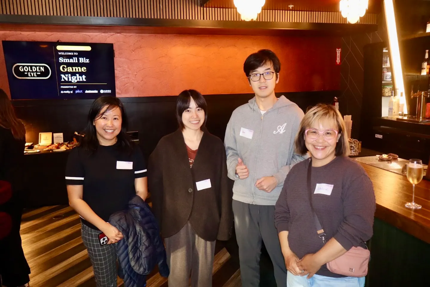 Community members posing together at Game Night w/ Justworks & Pilot.com (SF) (photo 2)