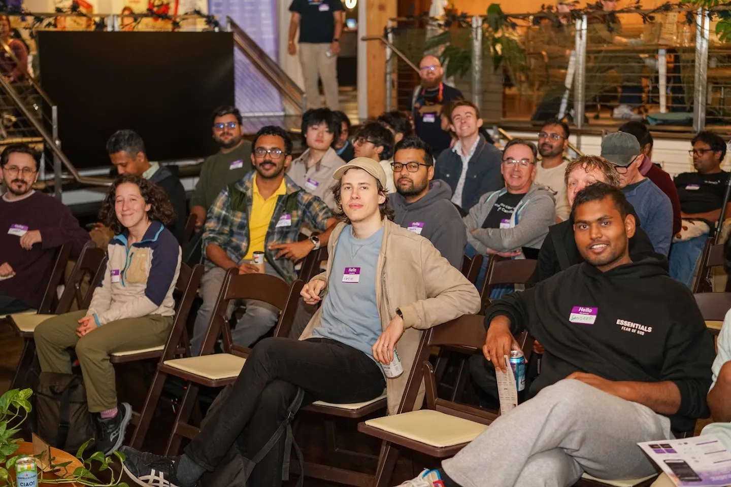 Audience members seated in the lounge for the discussion