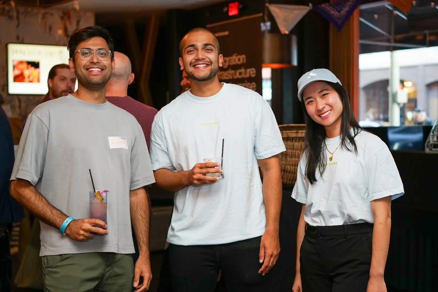 Guests posing together with drinks at Twilight in Novela