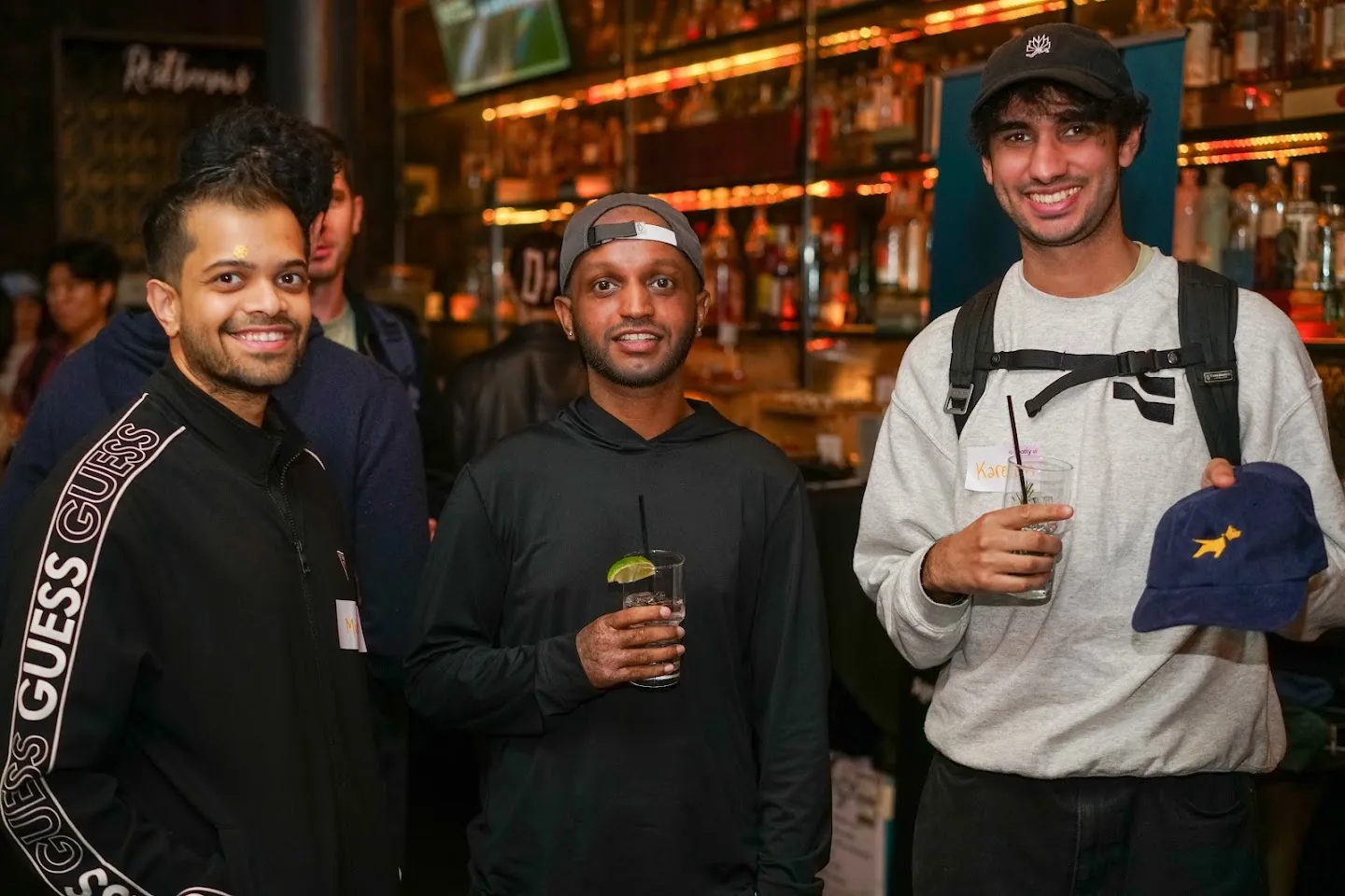 Guests posing together with drinks at Twilight in Novela