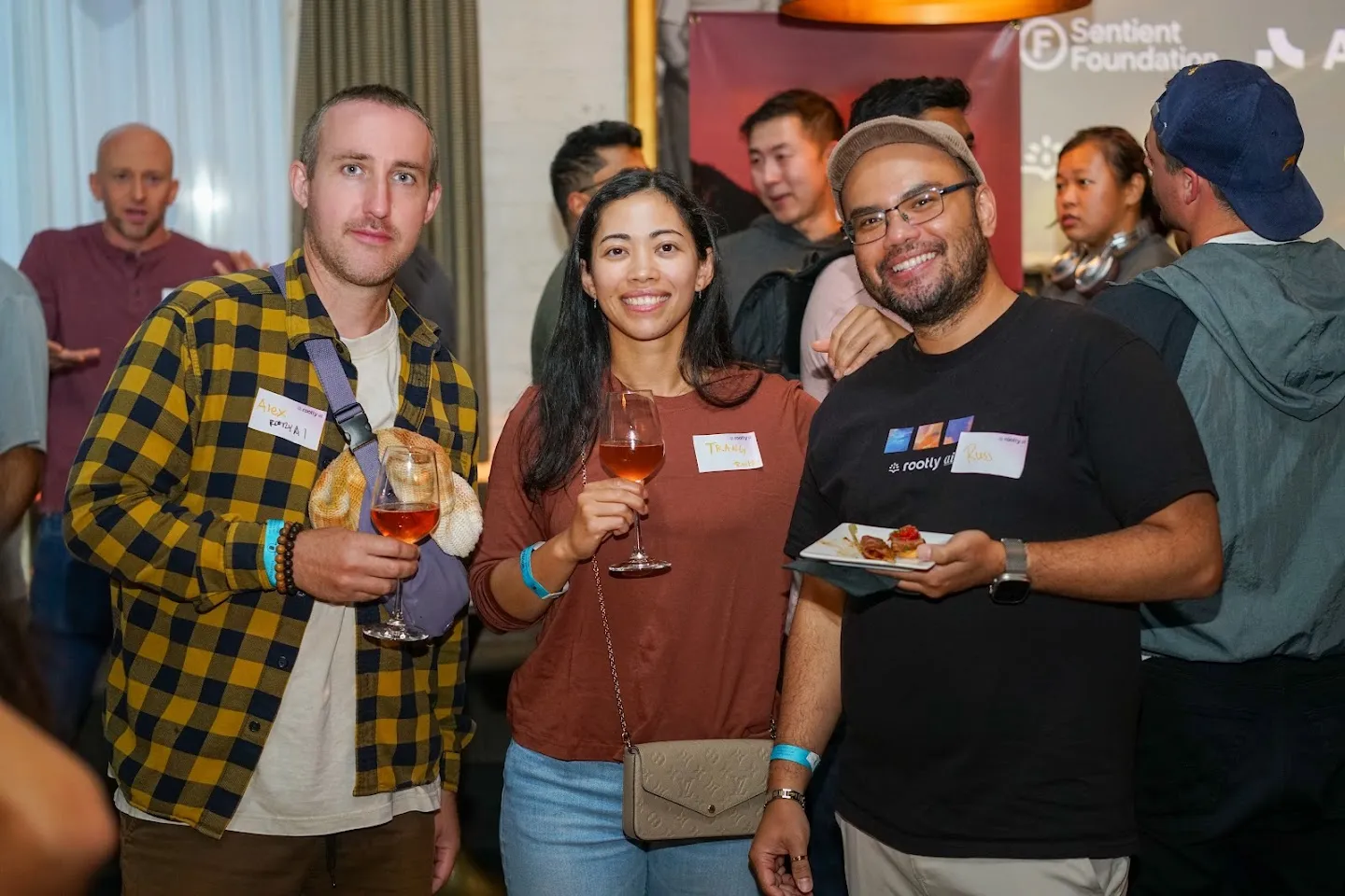 Guests posing together with drinks at Twilight in Novela