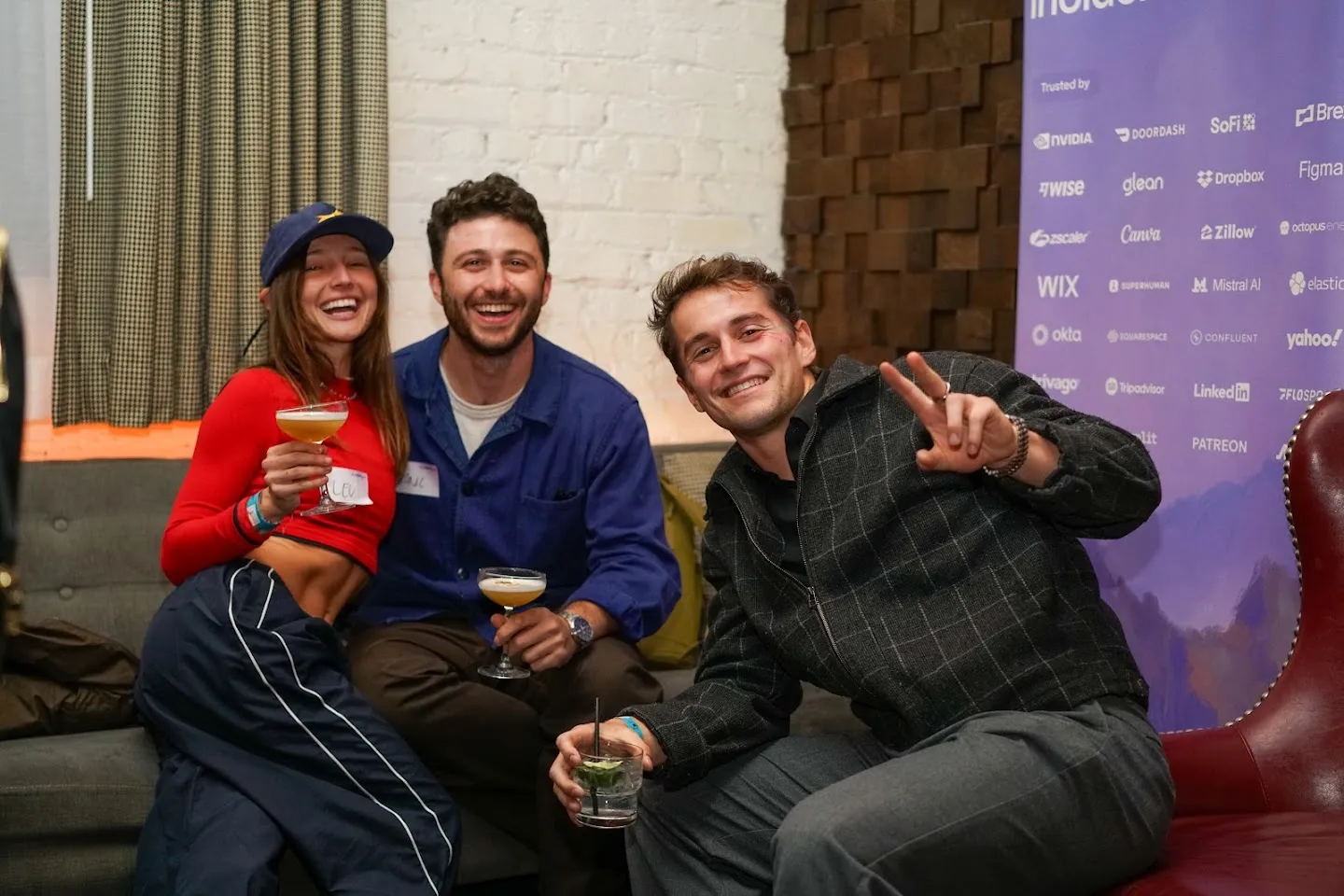 Guests posing together with drinks at Twilight in Novela