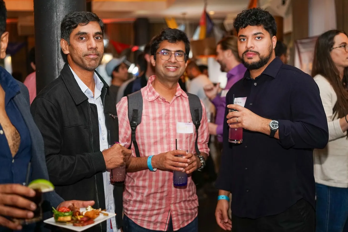 Guests posing together with drinks at Twilight in Novela